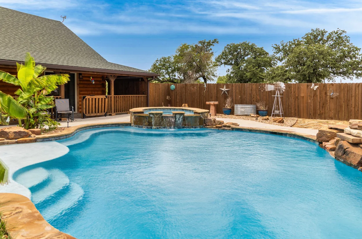 Authentic pool and outdoor living photograph from a Lipan property